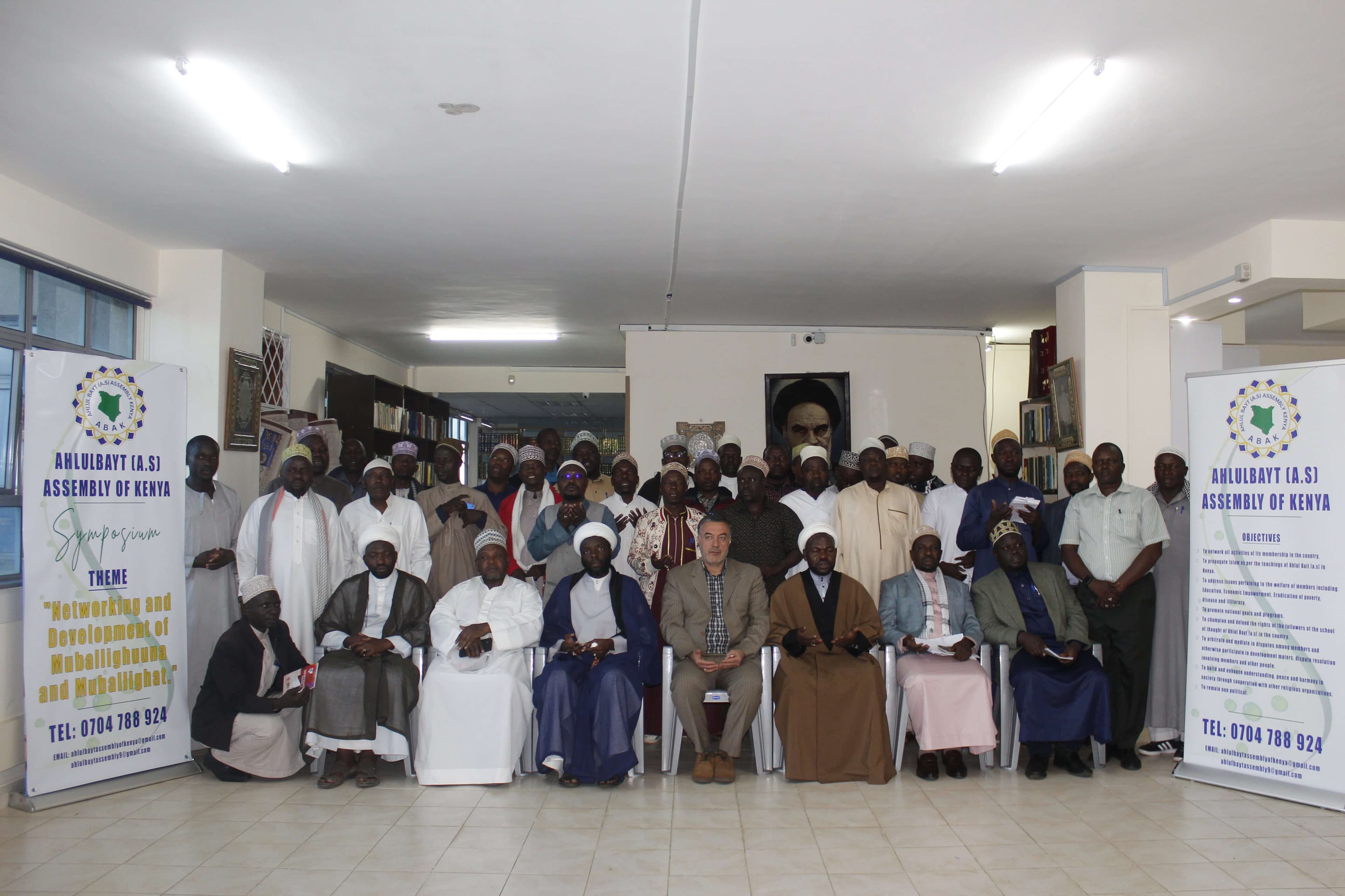 ABAK members and religious leaders gathered at an assembly symposium